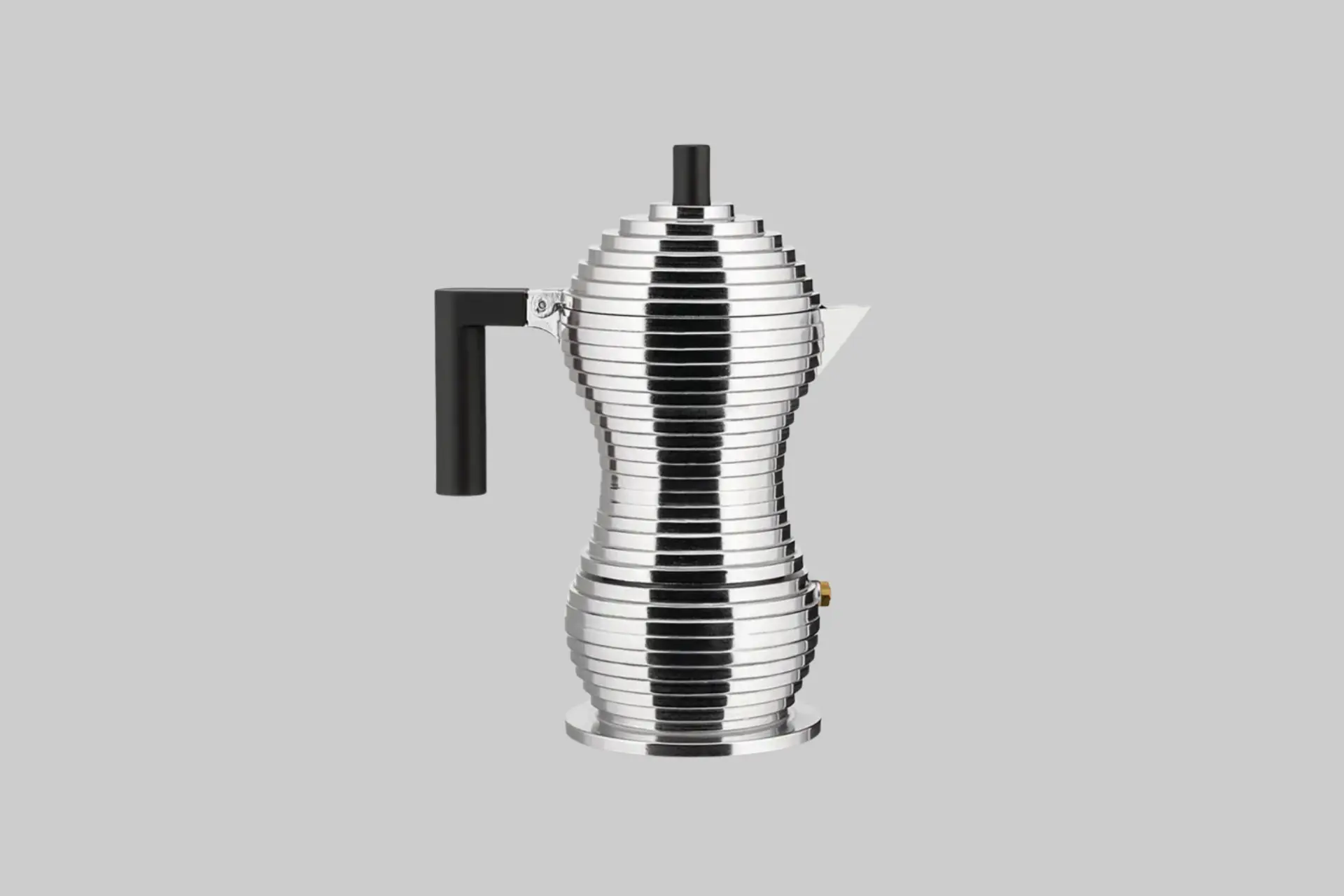 The Alessi Pulcina stovetop espresso coffee maker in black cast aluminum, showing its stepped body, beak-shaped spout, and black PA handle designed by Michele De Lucchi.