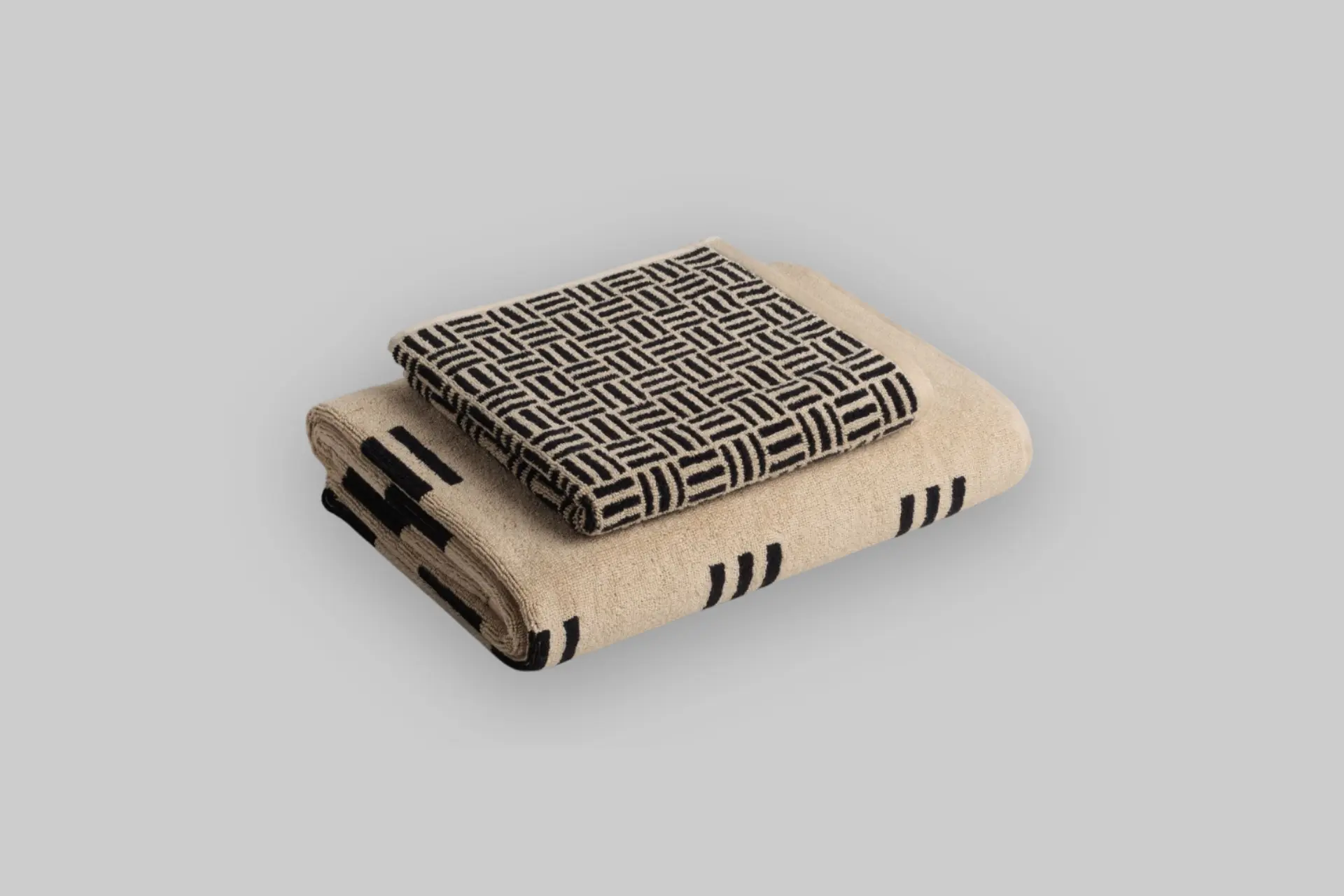 A neatly folded Baina Solitary Set in a serene color, showcasing the ribbed texture and high-quality organic cotton. - Product Review