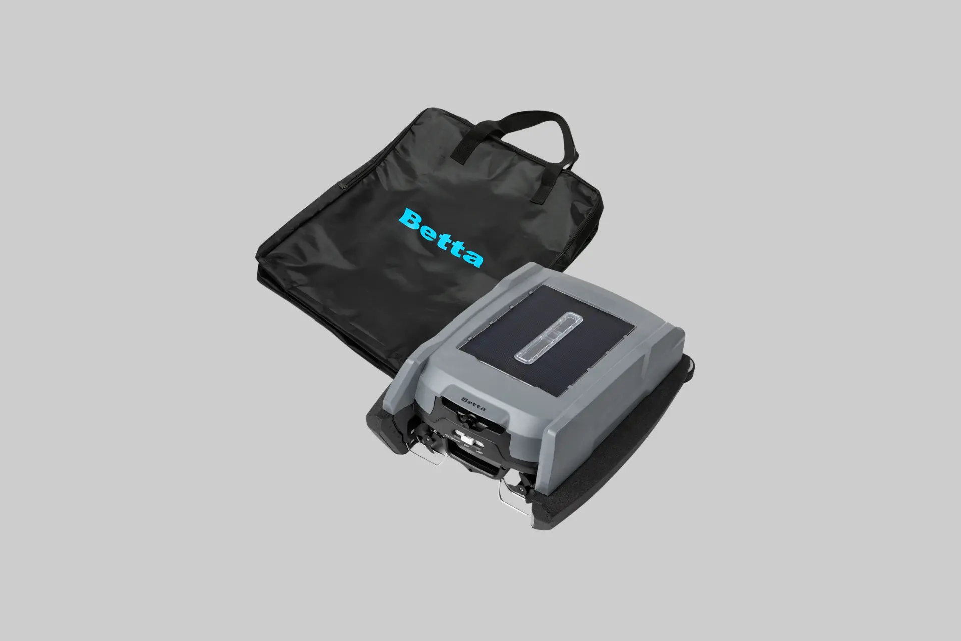 Betta Neo solar-powered robotic pool skimmer floating across a swimming pool collecting leaves and surface debris.