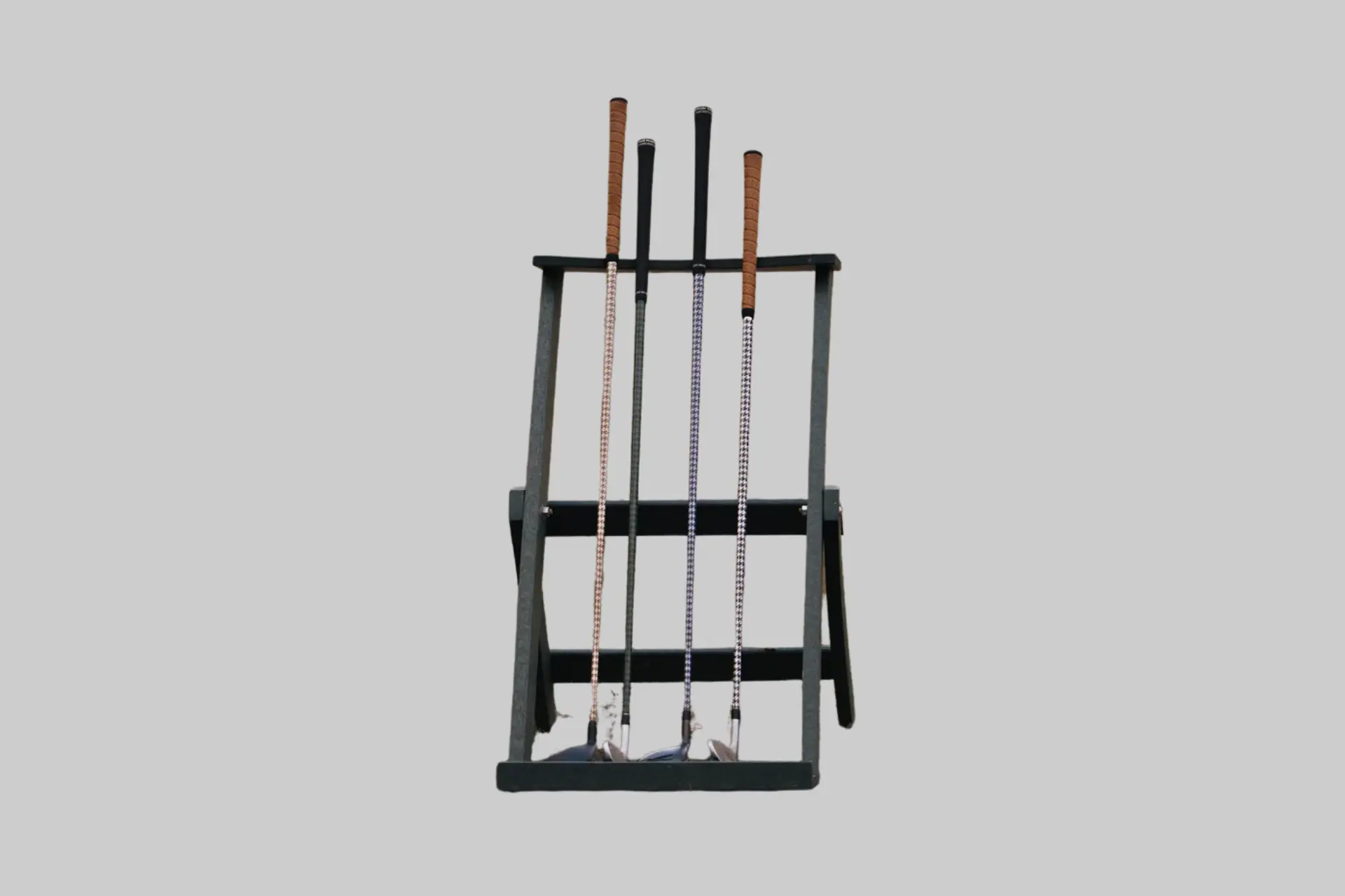 A golf club with a Caddy Wrap Houndstooth pattern applied to its shaft, showing the distinct black and white design. - Product Review