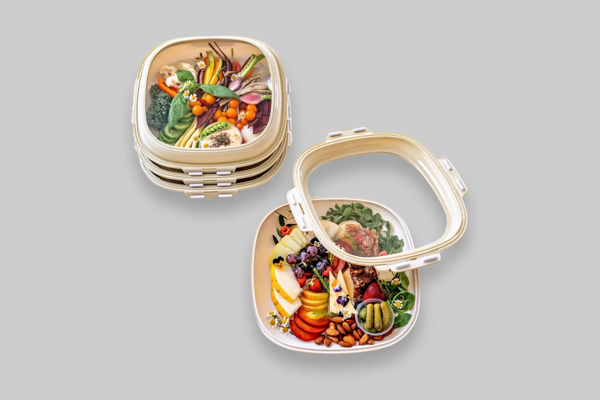A stack of cream white Crudités portable snack trays with reversible lids, filled with colorful fruits and vegetables. - Product Review