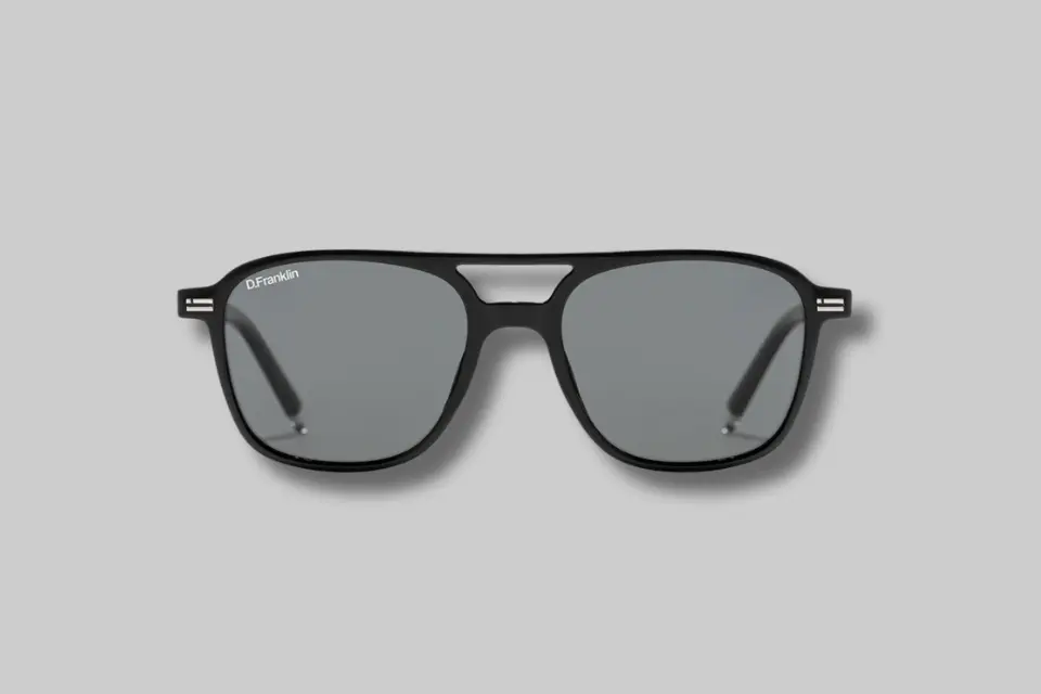 A pair of D. Franklin Jackson Square Shiny Black / Smoke sunglasses, showcasing their '80s-inspired design and shiny black frame. - Product Review