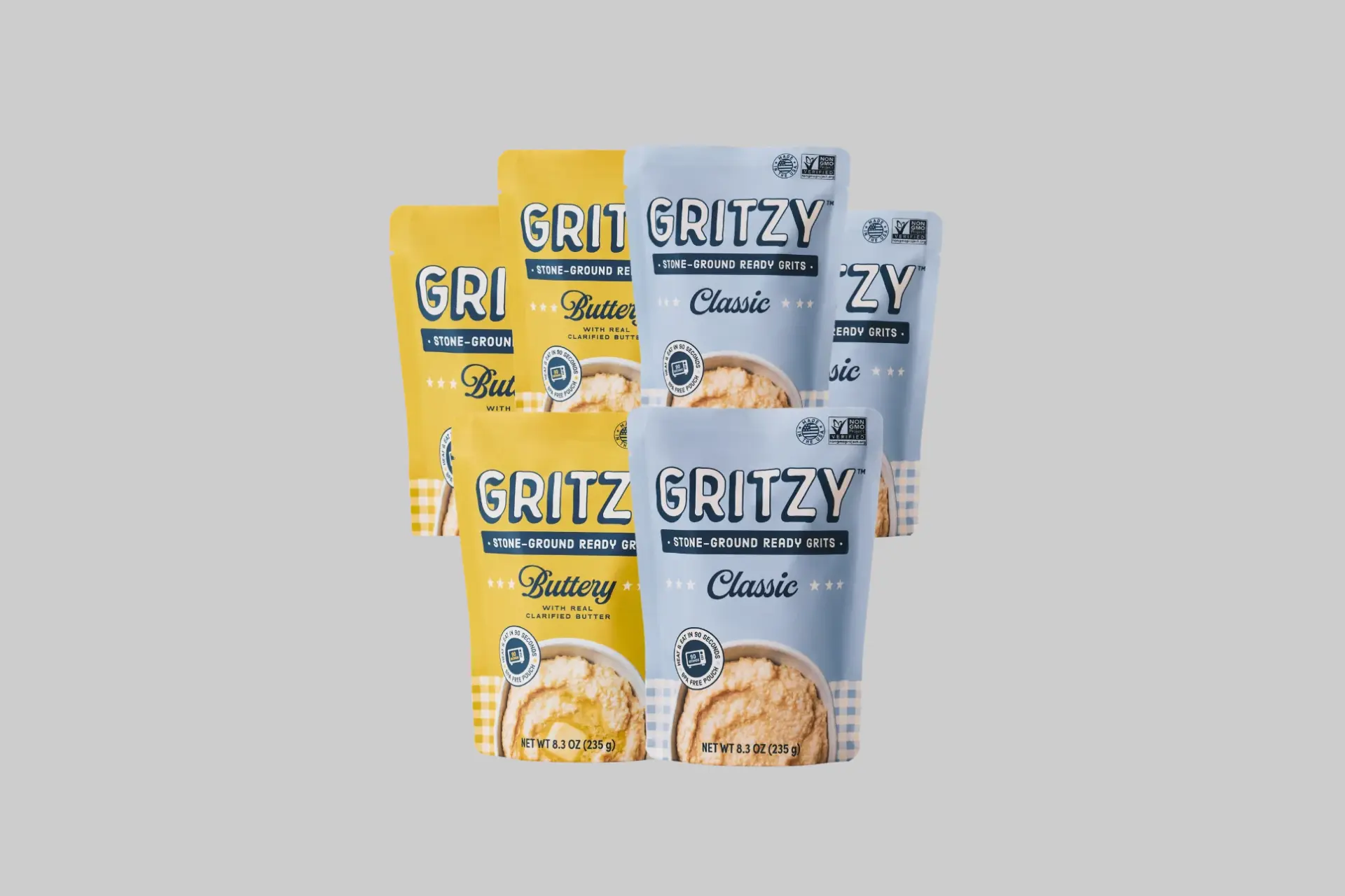 The Gritzy Classic and Buttery Variety 6-Pack showing three Classic and three Buttery 8.3oz pouches of stone-ground ready grits on a warm yellow background.