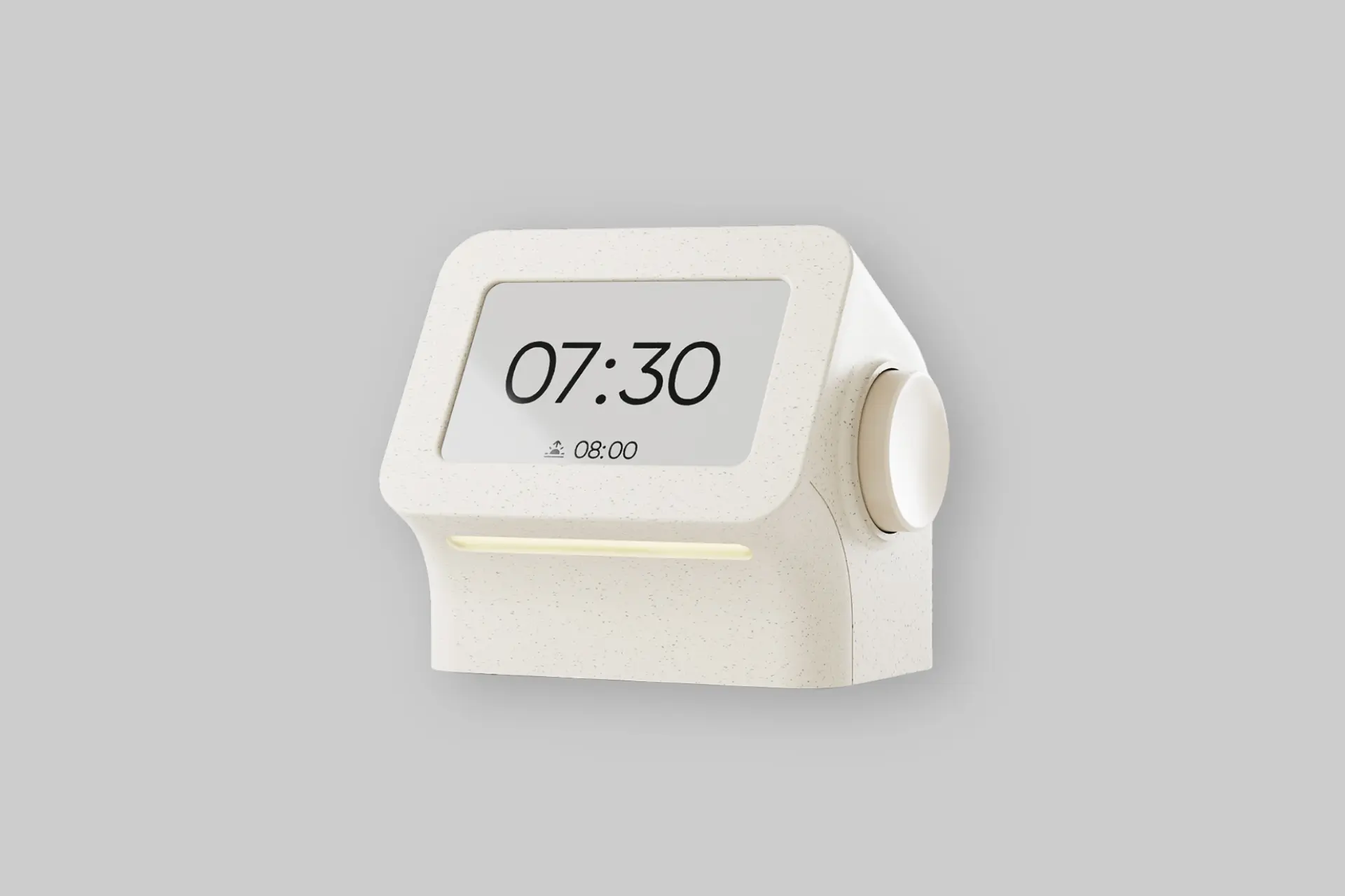 A minimalist Habity Bedside Clock on a nightstand, displaying time and ambient light, suggesting a calm bedroom environment. - Product Review