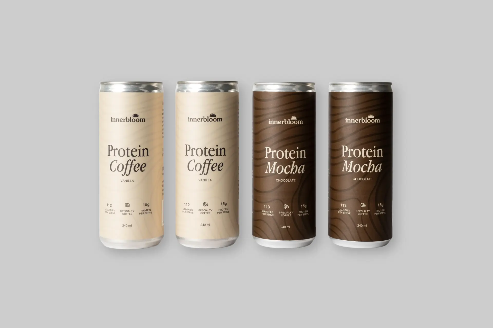 A three-pack taster selection of Innerbloom Protein Coffee cans, showcasing various flavors like Vanilla, Mocha, and Cinnamon Bun. - Product Review