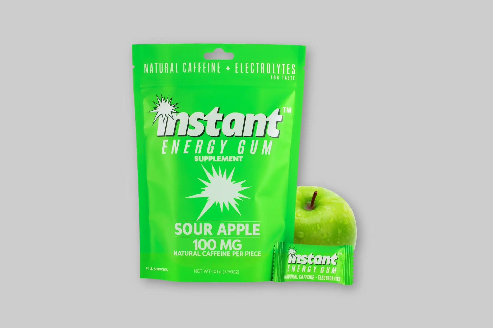 A pack of Instant Energy Gum, Sour Apple flavor, showing its compact size and highlighting natural caffeine and electrolyte content. - Product Review