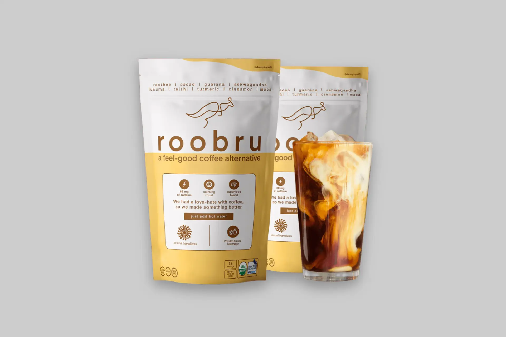 A warm mug of roo.bru superfood coffee alternative, surrounded by its key organic ingredients like rooibos, cacao, and reishi mushroom. - Product Review
