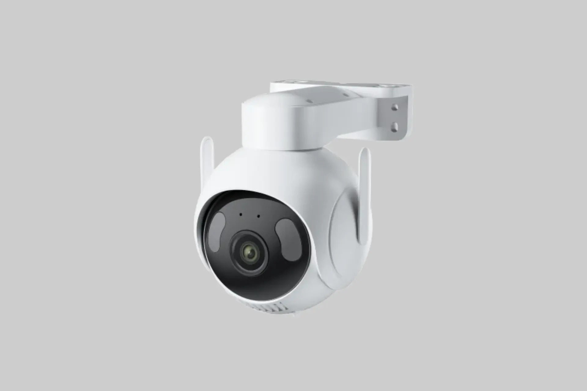 The SwitchBot 3K PTZ Outdoor Security Camera mounted on an exterior wall, showing its 360-degree pan and tilt housing, IR night vision array, and weatherproof white casing.
