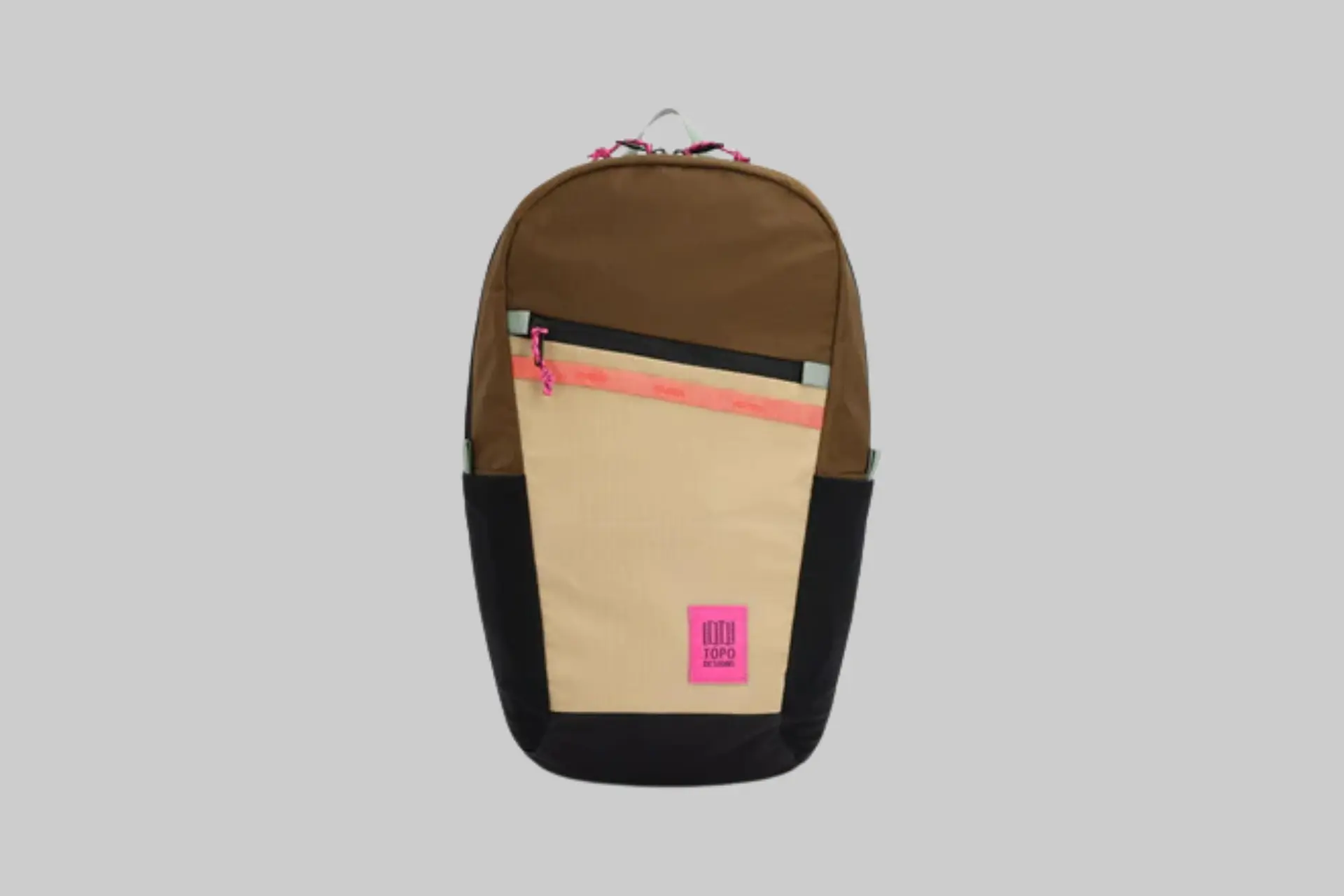 Topo Designs Peakview Packable Backpack in a vibrant color, folded into its internal pocket, and unfolded on a scenic trail. - Product Review