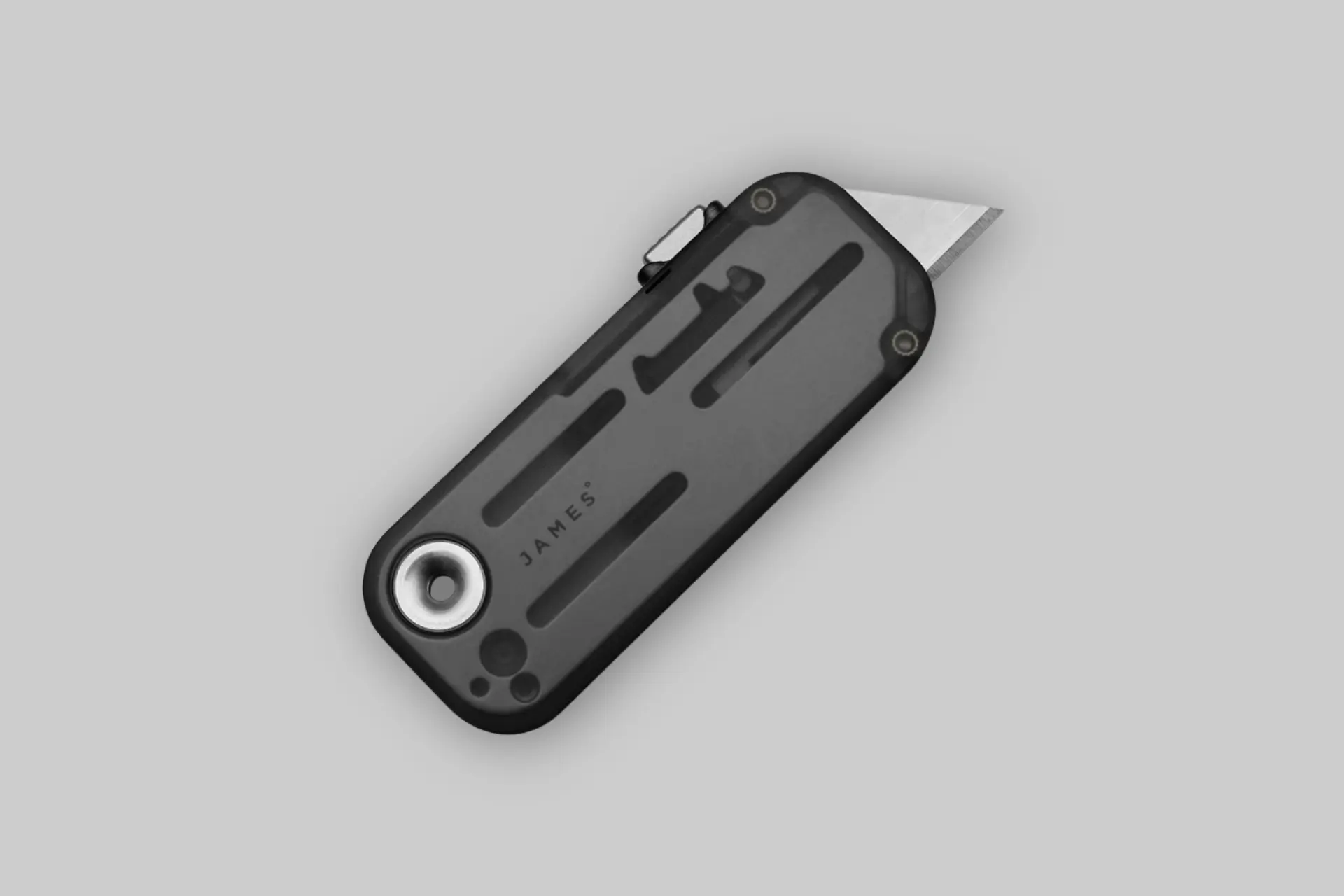The James Brand The Palmer utility knife in hand, showcasing its sleek design, anodized aluminum handle, and lanyard. - Product Review