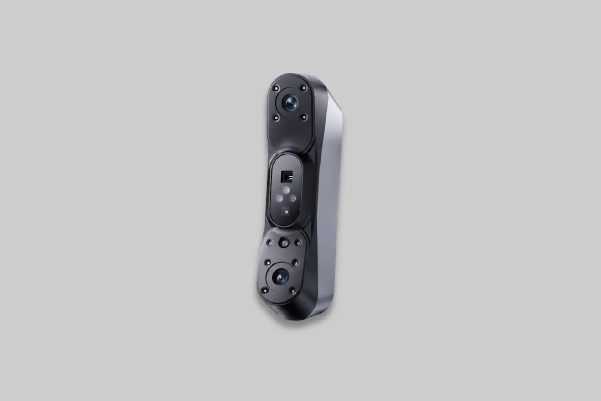 The Revopoint POP 4 handheld 3D scanner in white and black, shown in use capturing a detailed object scan, with the blue laser lines visible on the surface. - Product Review